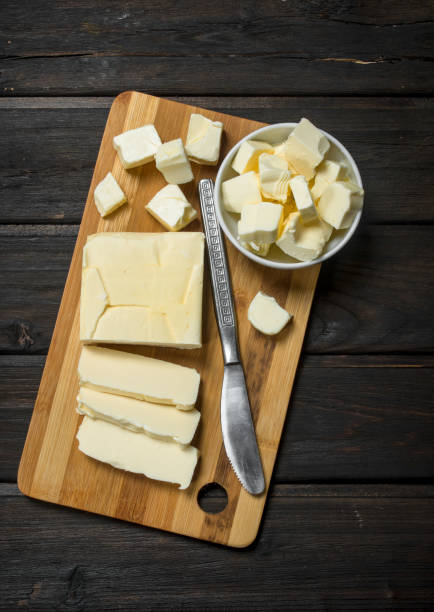 istock Butter on a wooden Board. 1141693053