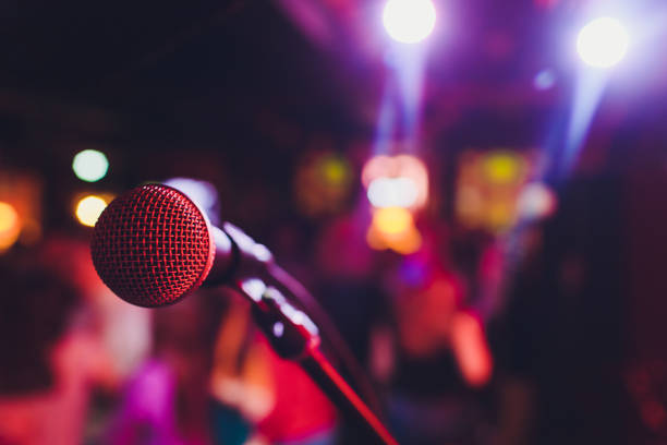 istock microphone against blur on beverage in pub and restaurant background. 1141693166