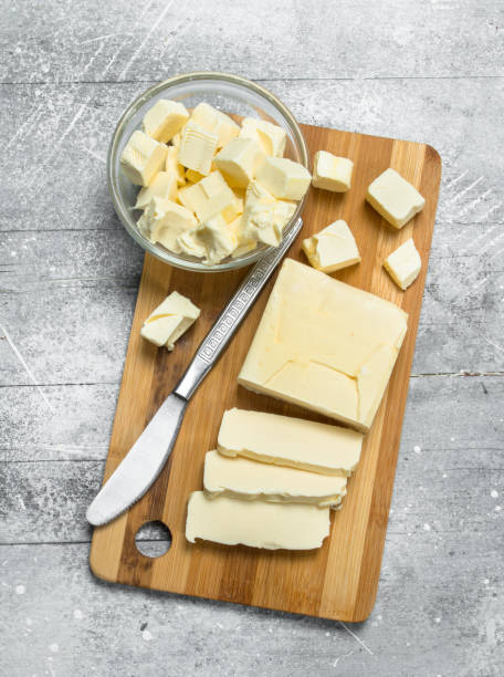 istock Butter on a wooden Board. 1141693173