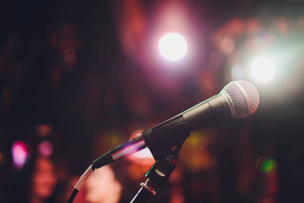 istock microphone against blur on beverage in pub and restaurant background. 1141693183