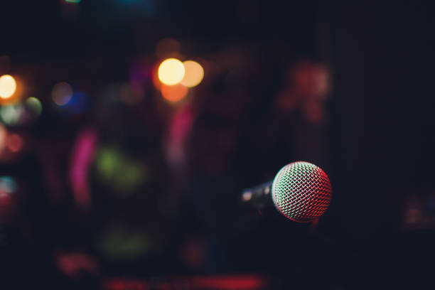 istock microphone against blur on beverage in pub and restaurant background. 1141693192