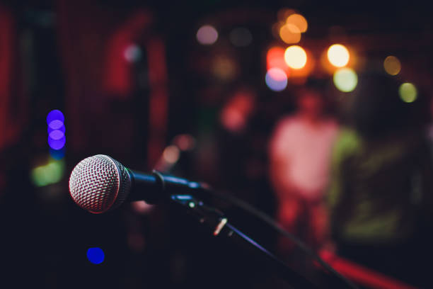 istock microphone against blur on beverage in pub and restaurant background. 1141693794