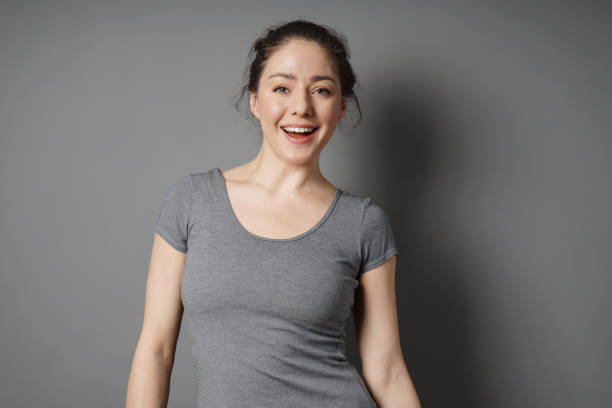 istock happy young woman with radiant smile 1141694765