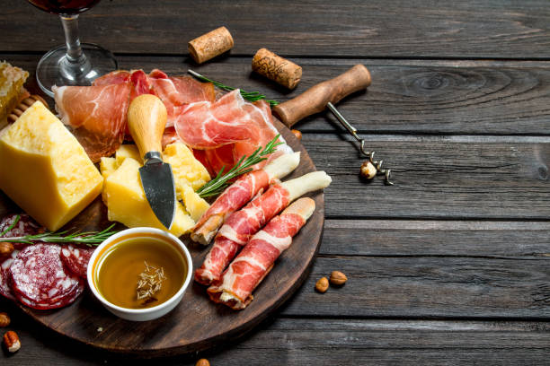 istock Antipasto background.Board with traditional Italian snacks. 1141695624