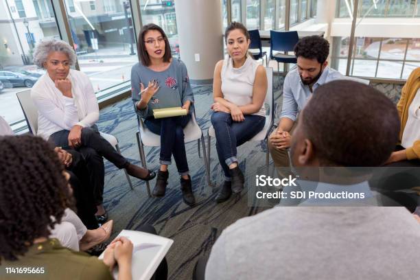 A Difficult Moment During A Breakout Session Stock Photo - Download Image Now - Group Of People, Meeting, Discussion