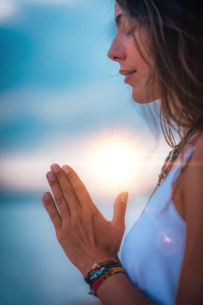 istock Meditating. Close Up Female Hands Prayer 1141696540