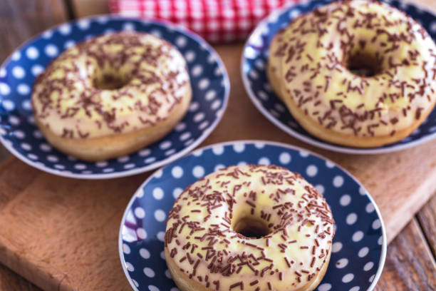istock Sweet breakfast, donuts sprinkled with chocolate 1141696670