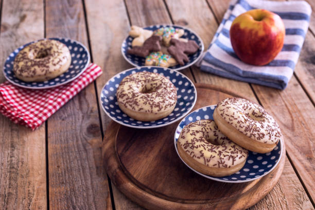 istock Sweet breakfast, donuts sprinkled with chocolate 1141696782