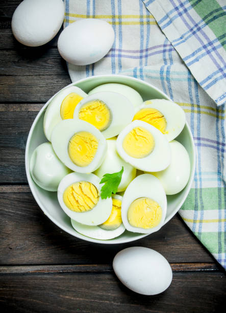 istock Boiled eggs in a bowl with parsley. 1141696812