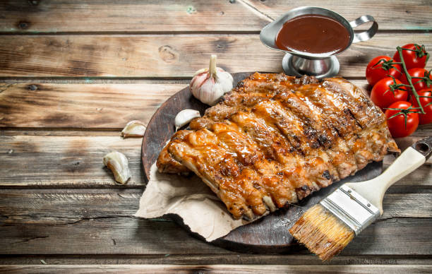istock Grilled ribs with tomato sauce and garlic. 1141697820