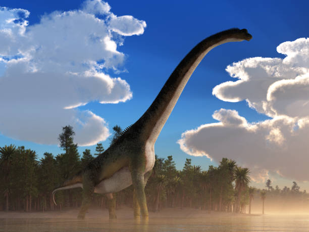 istock Giant Sauropod in a Lake 1141697973