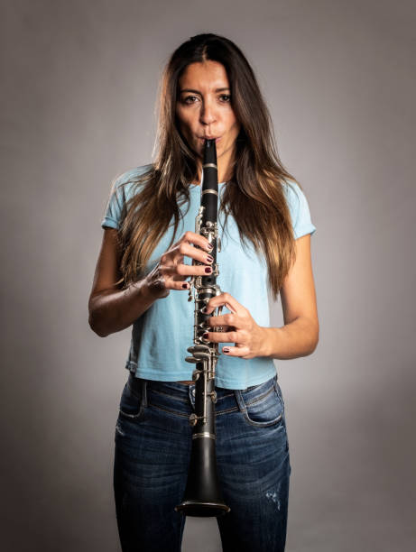 istock woman playing a clarinet 1141698555