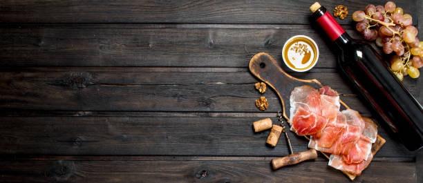 istock Traditional Spanish ham with red wine. 1141699718