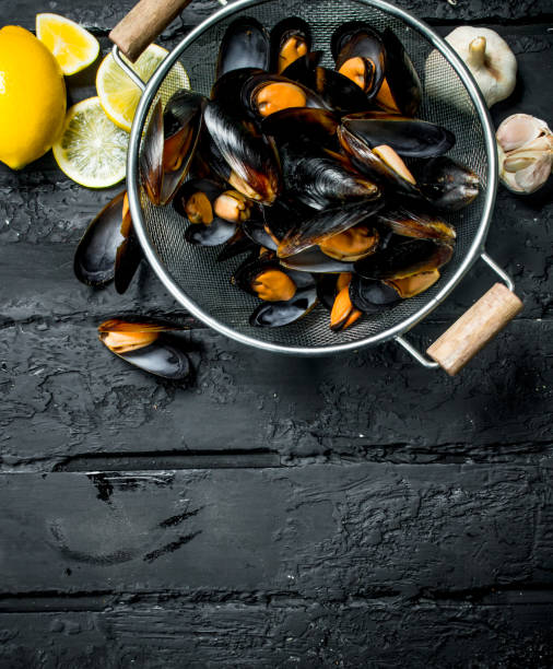 istock Fresh seafood clams with garlic and lemon. 1141701491