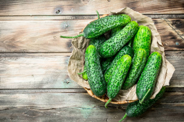 istock Green cucumbers in the basket. 1141701529