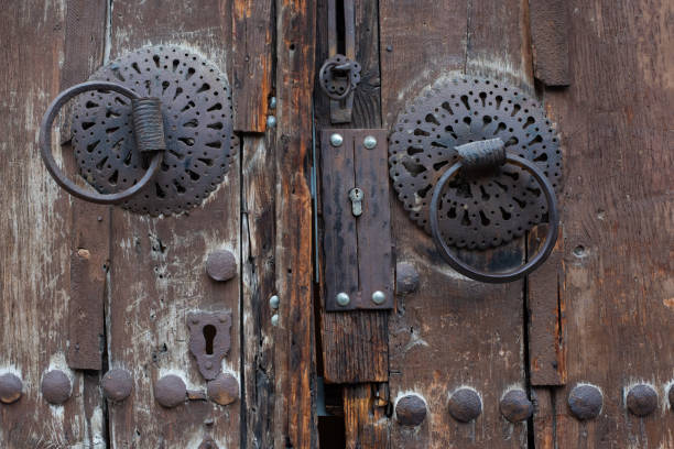Closeup of an old wooden door with beautifully crafted details.