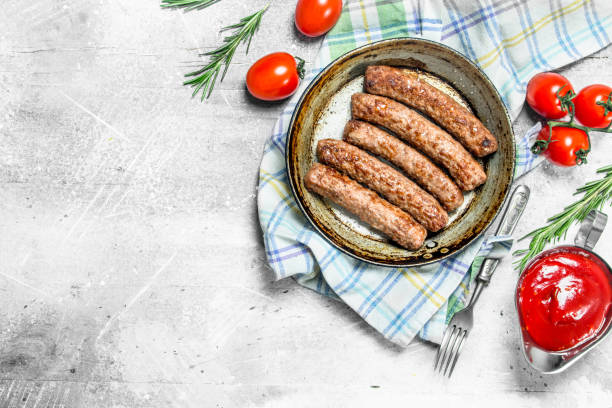 istock Grill sausages with tomato sauce . 1141704871
