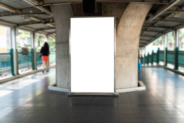 istock Blank mock up of vertical poster billboard on perspective horizontal outstanding on sky train platform 1141705496