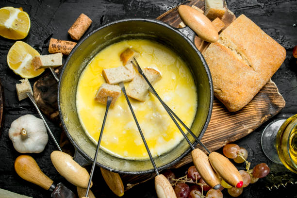 istock Delicious fondue cheese with white wine. 1141705577