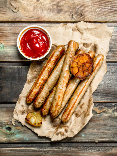 grill sausages with tomato sauce. - 7070 imagens e fotografias de stock