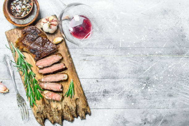 istock Grilled beef steak with red wine. 1141709473