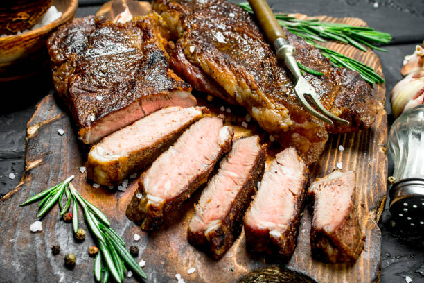 istock Grilled beef steak with rosemary and spices. 1141710010