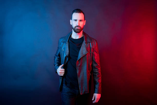istock Attractive man in leather jacket and black tshirt 1141713016