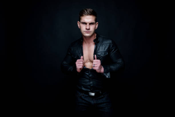 istock Attractive muscular man wearing black 1141715877