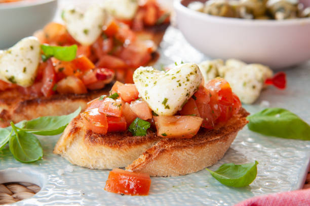 istock Toasted baguette with tomatoes and cheese 1141716516