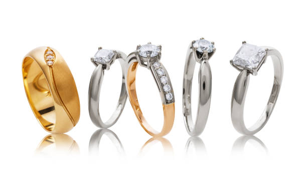 istock Various wedding gold rings with diamonds isolated on white background 1141717747