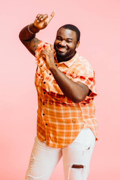 istock Plus size man with arms up, feeling great 1141725981