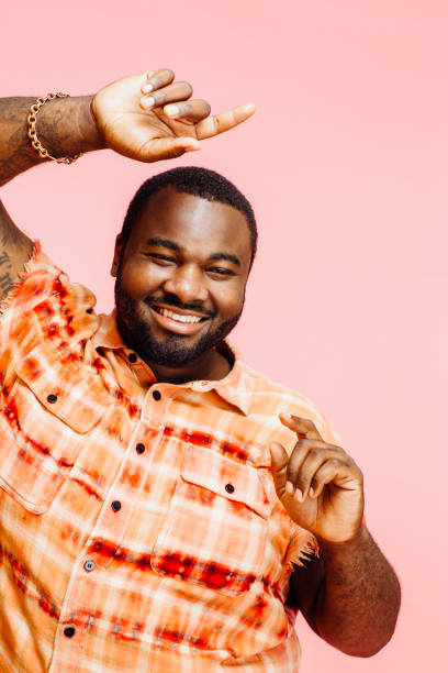 istock Plus size man with arms up, feeling great 1141725990