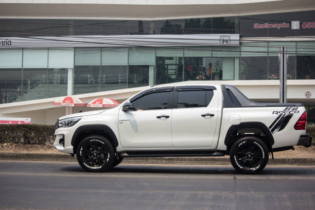 Private Pickup Truck Car Toyota Hilux Revo Chiangmai, Thailand - April 4 2019: Private Pickup Truck Car Toyota Hilux Revo. On road no.1001, 8 km from Chiangmai city. toyota hilux stock pictures, royalty-free photos & images