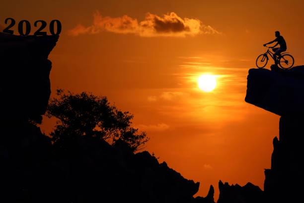 New year 2020 silhouette background concept.Mountain and sunset background.