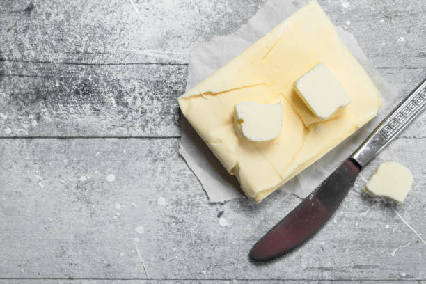 istock Butter on paper with a knife 1141728301
