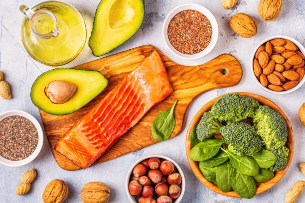 istock Animal and vegetable sources of omega-3 acids. Balanced diet concept. 1141729270
