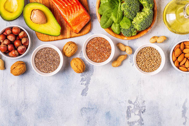 istock Animal and vegetable sources of omega-3 acids. Balanced diet concept. 1141729511