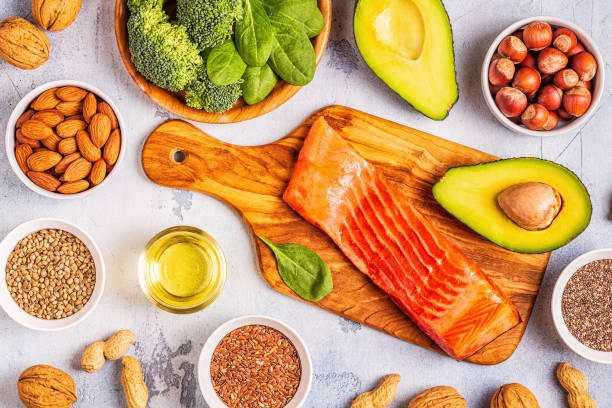 istock Animal and vegetable sources of omega-3 acids. Balanced diet concept. 1141729682