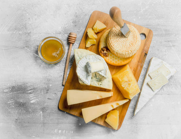 istock Different types of cheese with honey. 1141729858