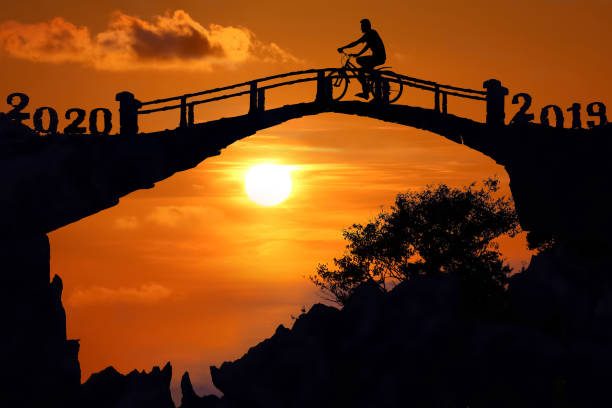 New year 2020 silhouette background concept.Mountain and sunset background.