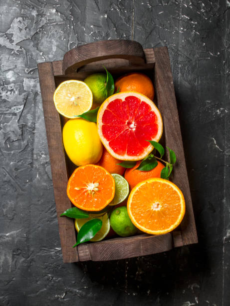 istock Juicy citrus in a wooden box. 1141731621