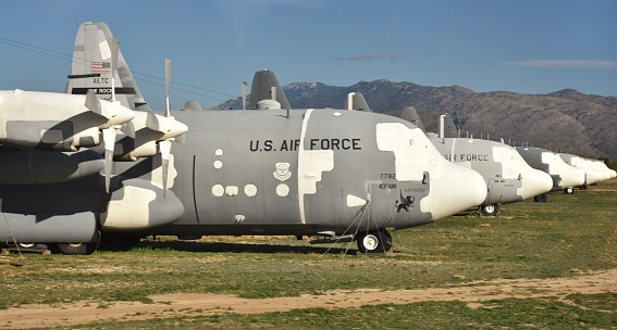 Tucson, Arizona, USA - January 18, 2019: A fleet of C-130 cargo planes in long-term storage at the Air Force Boneyard at Davis-Monthan, operated by the 309th Aerospace Maintenance and Regeneration Group (AMARG)