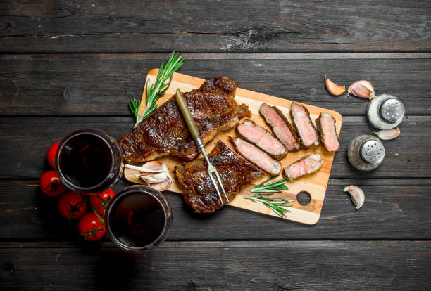 istock Grilled beef steak with red wine. 1141734605
