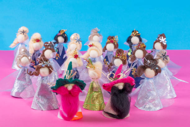 istock Handmade baby dolls using felted wool on a colored background 1141735467