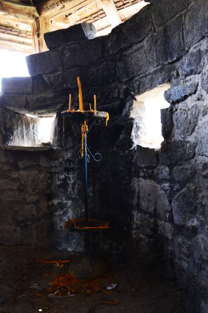 istock candles in the old stone church 1141735587