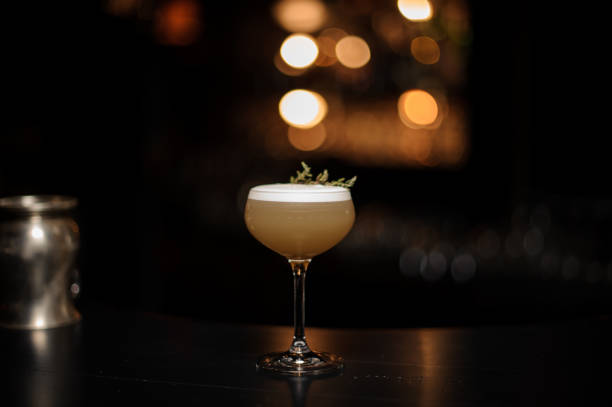 istock Light brown cocktail on a bar counter 1141736419