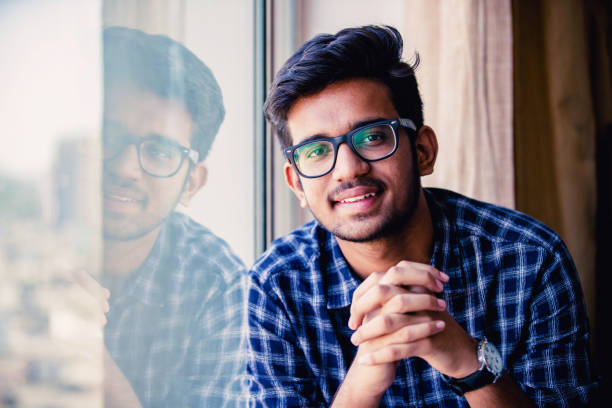 Portrait of a Confident Young Man University Student, Portrait, Positivity, Aspirations - Young Lad Looking at the Camera for a Portrait asian adult student stock pictures, royalty-free photos & images