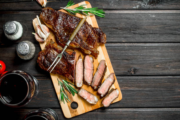 istock Grilled beef steak with red wine. 1141737713