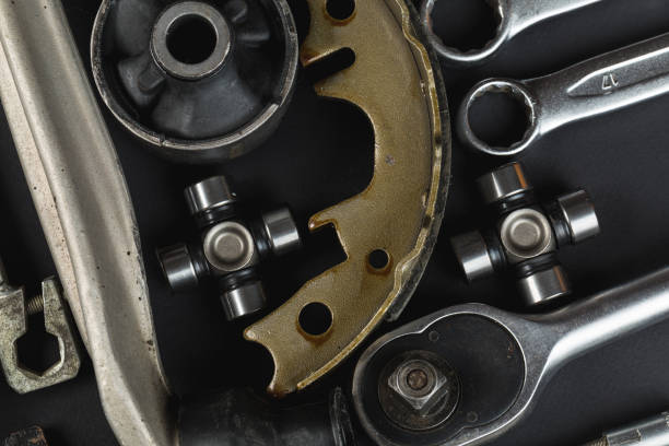 istock Various Car parts on dark background 1141738072