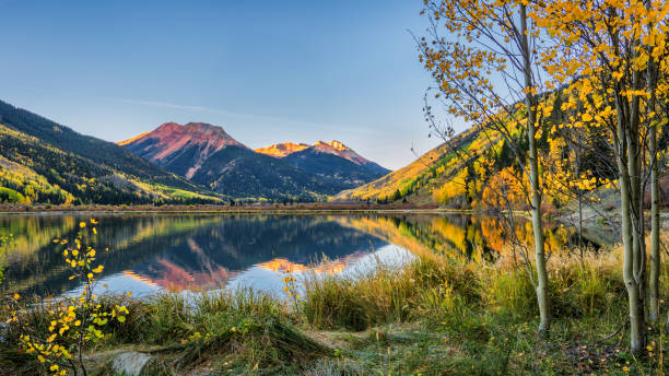 Autumn sunrise at Crystal Lake - Million Dollar Highway - Colorado Autumn sunrise at Crystal Lake - Million Dollar Highway - Colorado Rocky Mountains ridgway stock pictures, royalty-free photos & images